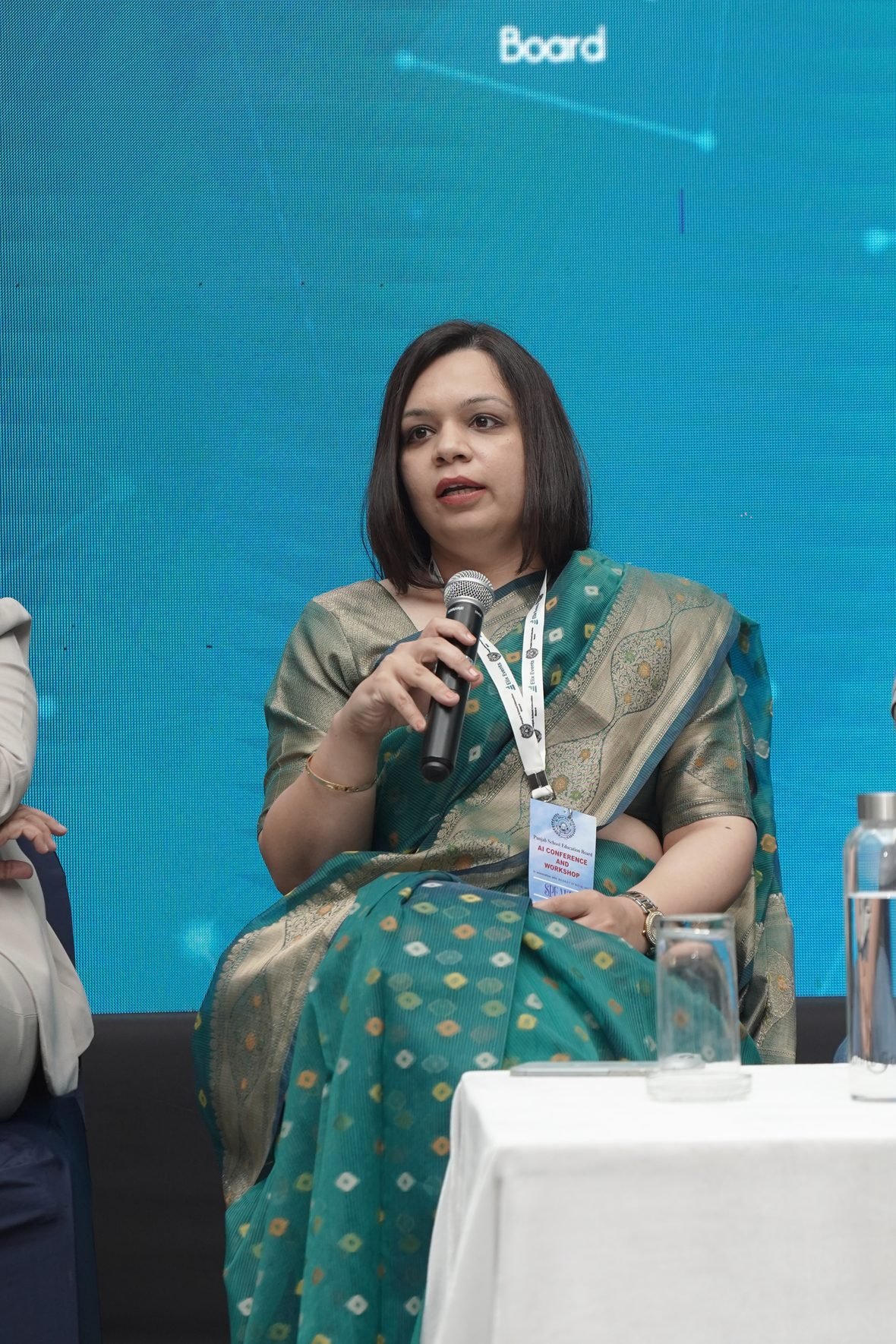 Shweta Nagpal speaking on a panel at an AI conference